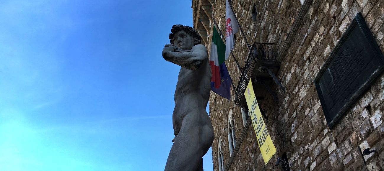 Copy of David by Michelangelo in front of the Palazzo Vecchio, Florence Walking tour